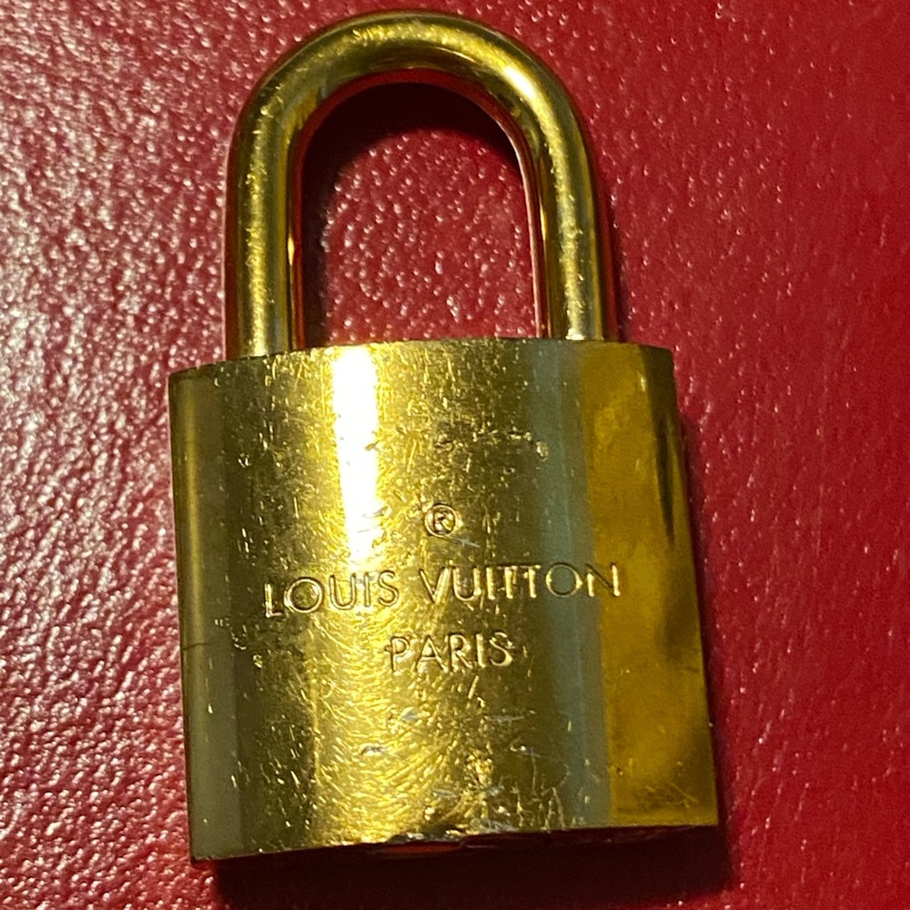 Louis Vuitton Gold Lock Accessory